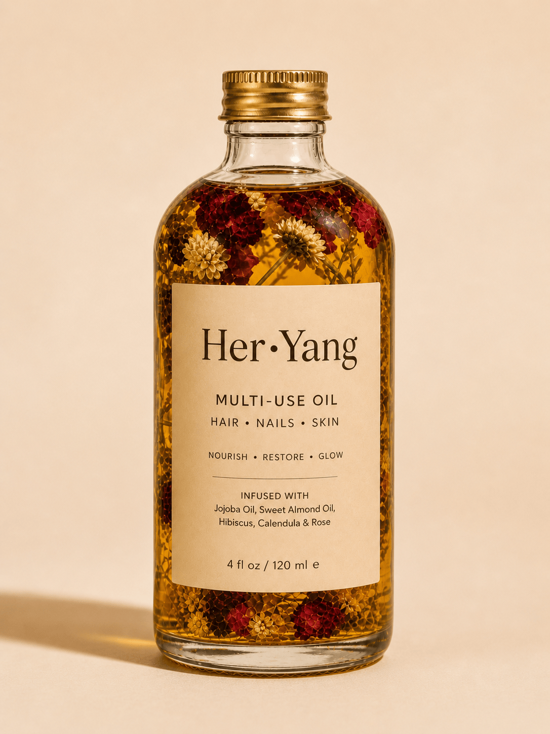 Her•Yang Rose Multi-Use Glow Oil bottle with dropper, featuring a rose design and clear glass packaging.