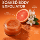 Her•Yang Glow Luxe Sugar Body Scrub jar with textured label and open lid showing the exfoliating sugar scrub inside.