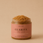 HerYang Clarity™ Body Acne Scrub showing the exfoliating texture with natural ingredients on a white background.