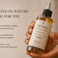 Her•Yang The Retention Ritual Duo™ hair oil bottles, natural hair care product for scalp and hair nourishment.