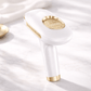 Her•Yang SilkSmooth™ IPL Hair Removal Device shown with sleek design and control panel for at-home hair removal treatments.