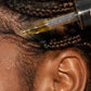 Her•Yang Temple Bloom™ Hairline & Edge Elixir hair oil bottle with dropper, designed for hairline and edges care.